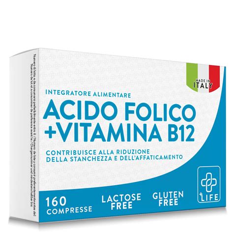 Immagine di pillole di acido folico e verdure a foglia verde