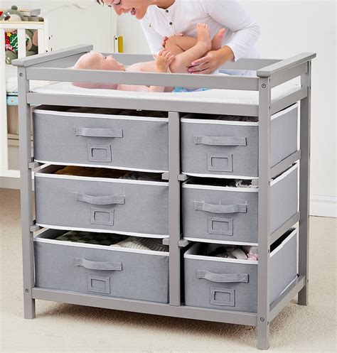 organizing baby changing station with drawers