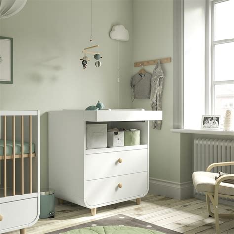 ikea myllra changing table in a nursery room