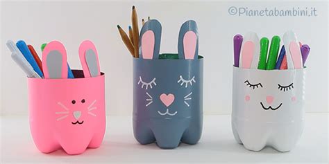 Lavoretto creativo di un Bambinello in culla realizzato con bottiglia di plastica