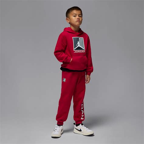 bambino con pantaloni Jordan grigi in felpa