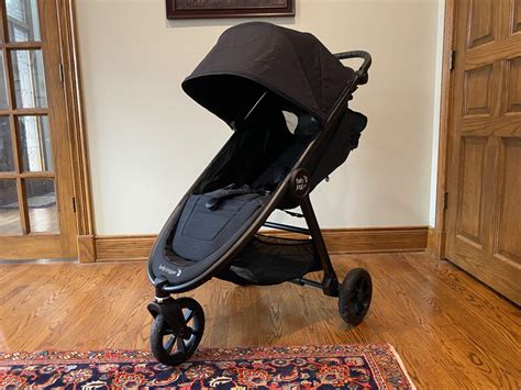 Vista ravvicinata della cinghia di piegatura del Baby Jogger City Mini
