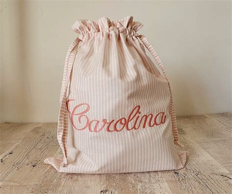 Sacchetto nascita personalizzato con nome ricamato