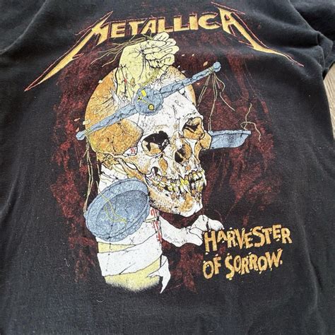 Collezione di magliette di band rock