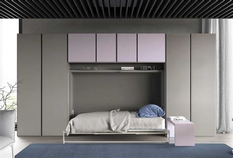 Esempio di cameretta componibile con letto a ponte e armadio integrato