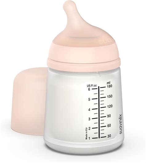 Biberon con latte materno riscaldato a bagnomaria