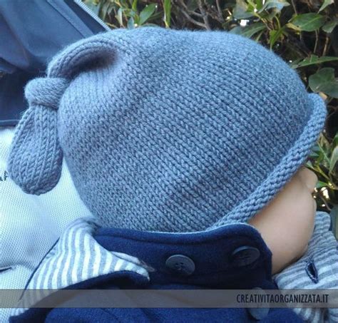 Neonato con cappellino