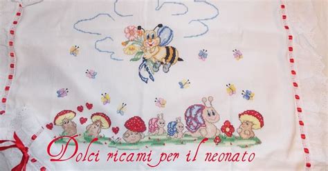 Copertina neonato con ricamo a punto maglia