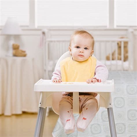 Bambino seduto nel seggiolone Cam S2300