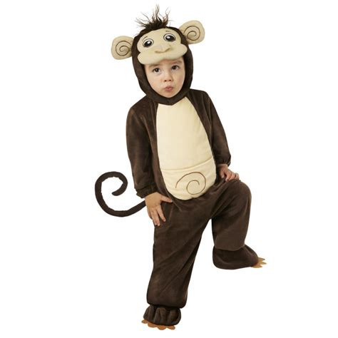 Bambino che indossa un costume da scimmia verde