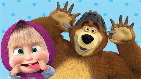 Masha e Orso in un campo fiorito